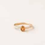 Bague sertis clos ovale - or jaune - grenat spessartite ovale