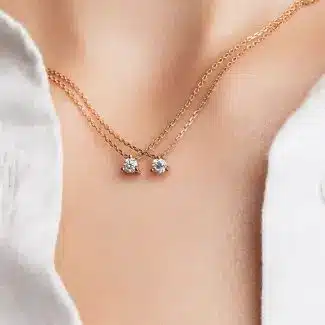 Colliers 3 griffes 0.50 carat or jaune et rose
