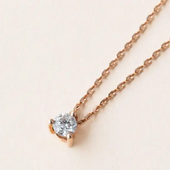 Collier solitaire 3 griffes diamant 0.50 carat or rose