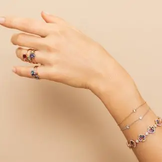 Bracelet diamants sertis clos et trèfle saphirs