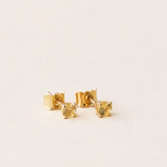 Boucles d'oreilles saphir jaune sur or jaune - clous / puces