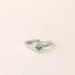 Bague émeraude et diamant halo or blanc de charles arteon joaillerie