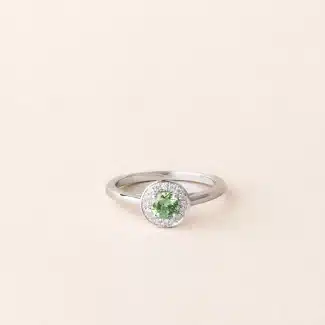 Bague émeraude et diamant halo or blanc de charles arteon joaillerie