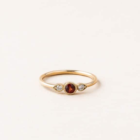 Bague Perlée grenat - or jaune - grenat et diamants
