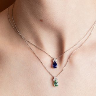 Colliers tanzanite diamants perlé portés en or blanc serti d'une tanzanite et d'une tourmaline lagon avec trois diamants