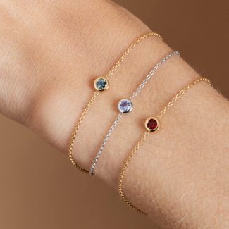Bracelets serti clos grenat or jaune, tanzanite or blanc et saphir teal or jaune - Modèle Serti clos de Charles Arteon Joaillerie